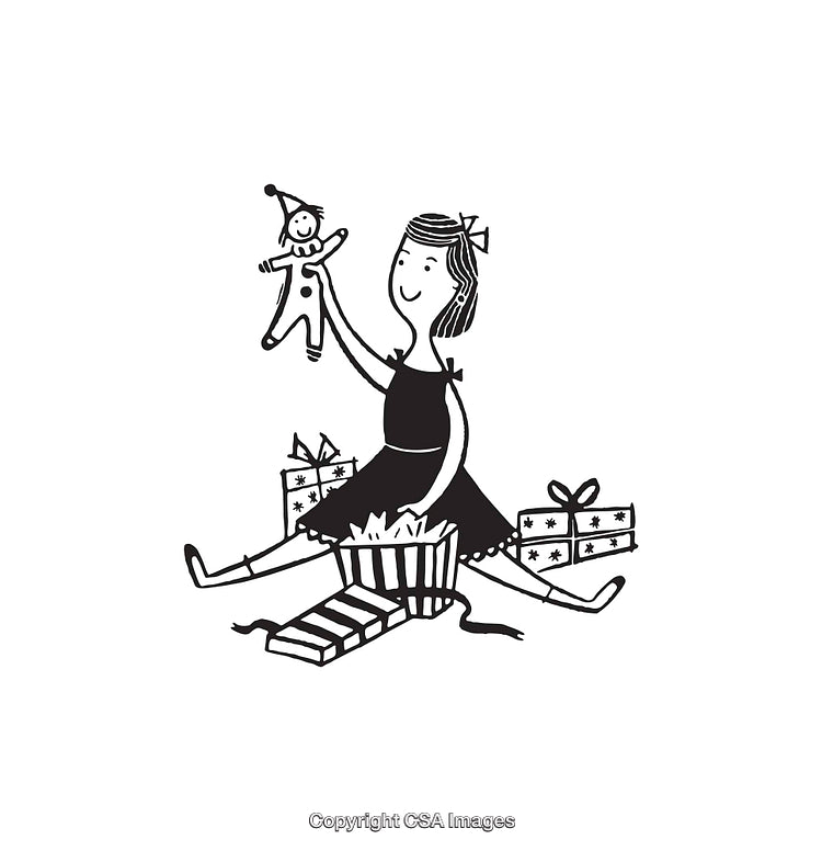 Happy Girl Opening Gifts and Playing with a New Doll