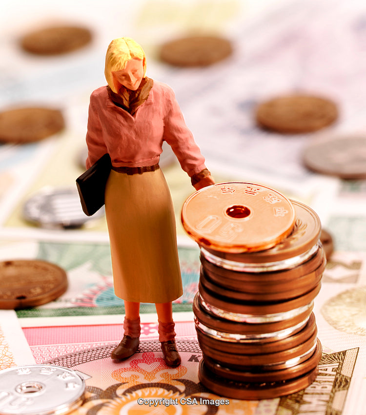 Miniature Woman Standing Next to Coins on Currency Background