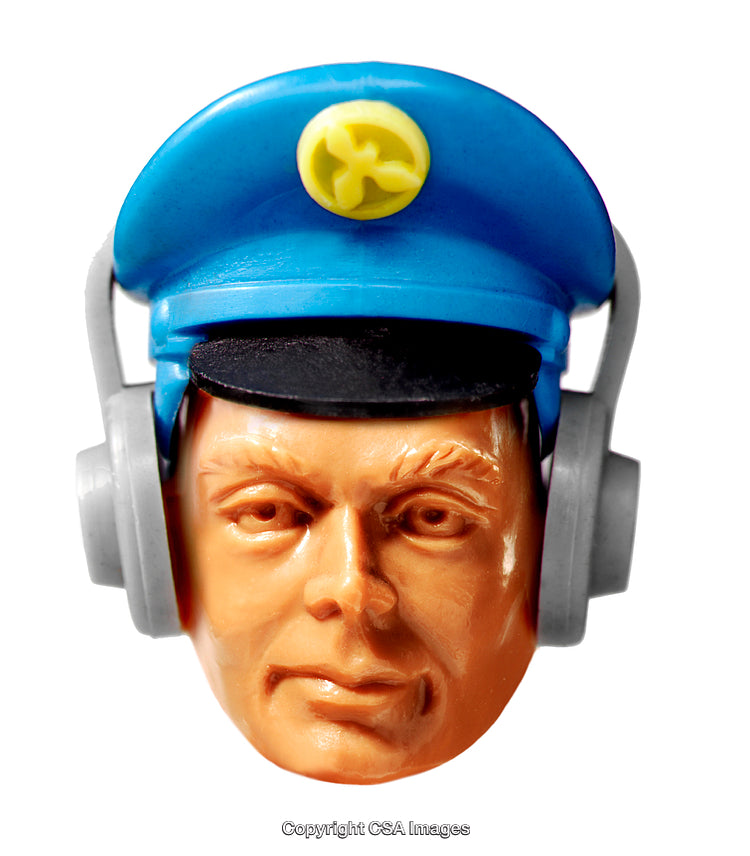 Close-Up of Toy Figurine Wearing a Cap and Headset