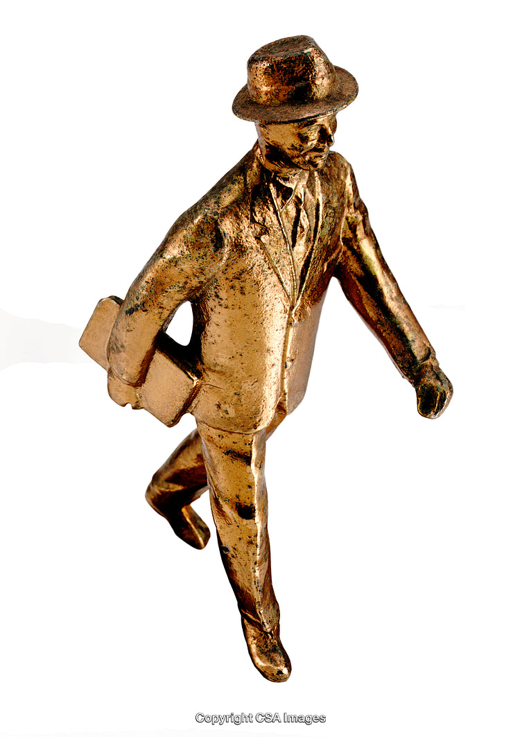 Gold Figurine of a Professional Man in a Hat Walking Forward
