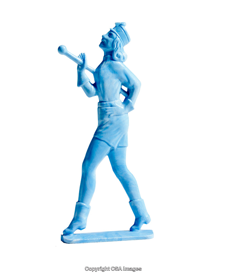 Blue Plastic Toy Figure of a Flamboyant Performer Isolated on White Background