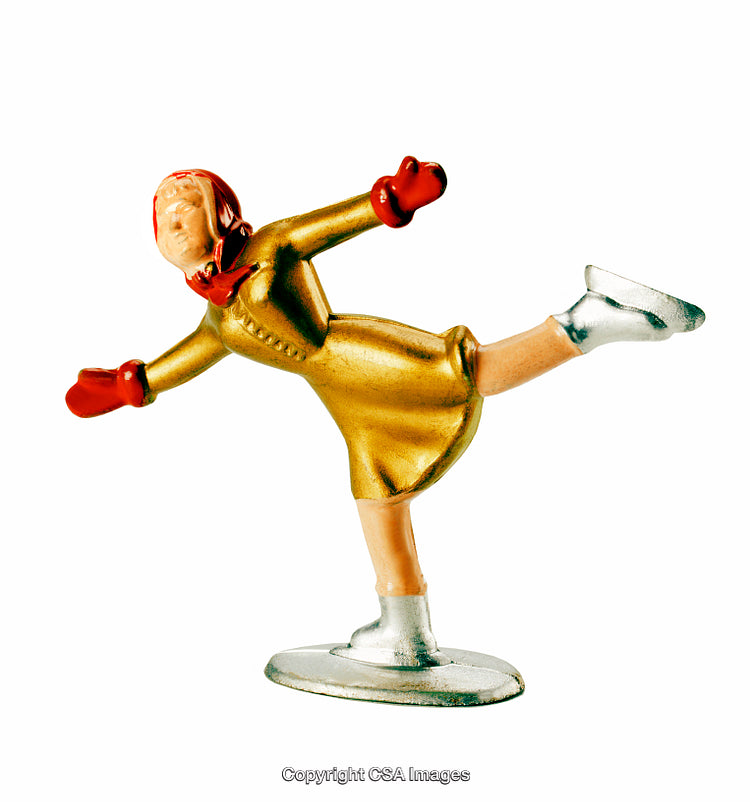 Vintage Figurine of a Woman Ice Skating on White Background