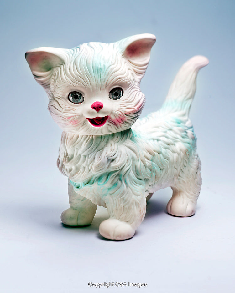 Ceramic-Like Cat Figurine With Cute Features and Detailed Carving