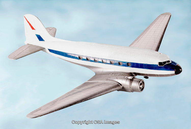 Model of Vintage Airplane with Blue Accents on Light Blue Background