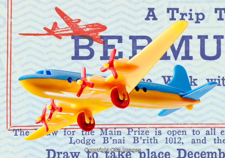 Bright Toy Airplane Against Bermuda Travel-Themed Background With Text Elements