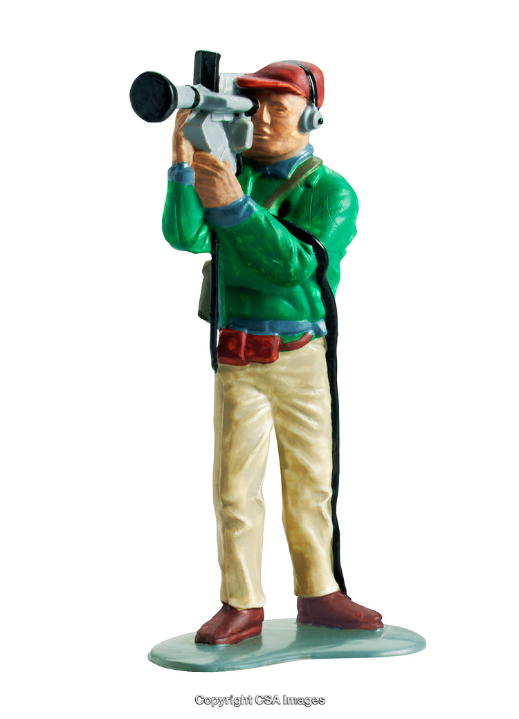 Plastic Figurine of a Videographer Filming with Camera on White Background