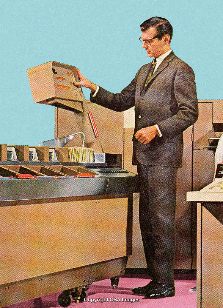 Retro Image of a Businessman Using Vintage Office Equipment