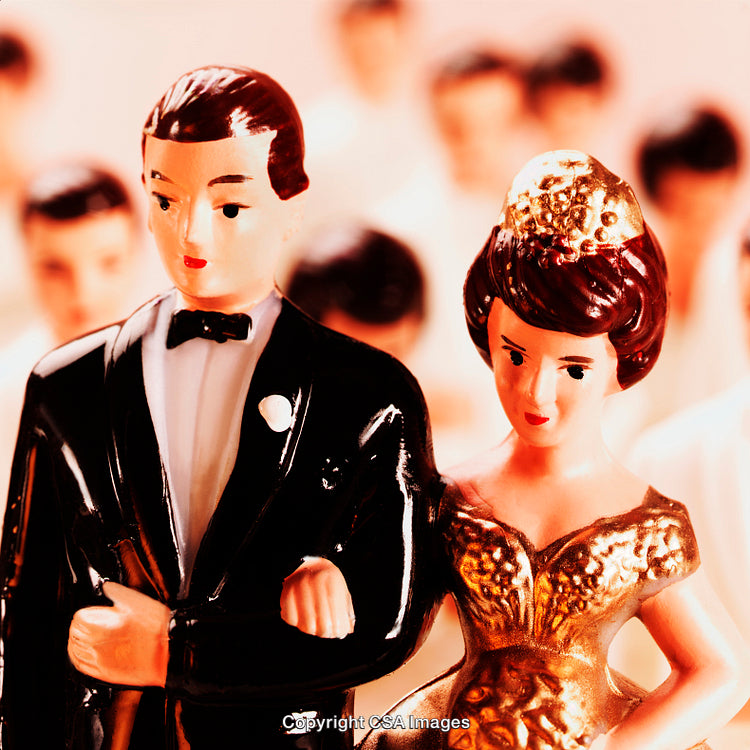 Vintage Wedding Cake Topper Depicting Bride and Groom Figurines