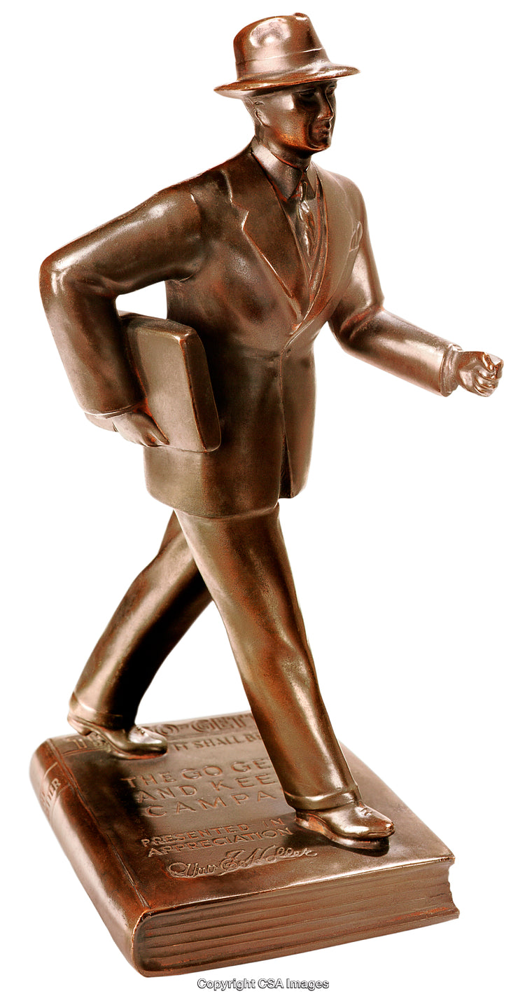Vintage Bronze Statue of a Businessman Stepping Confidently on a Large Book