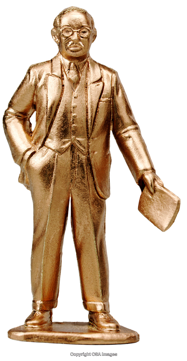 Golden Figurine of a Distinguished Gentleman Holding a Document