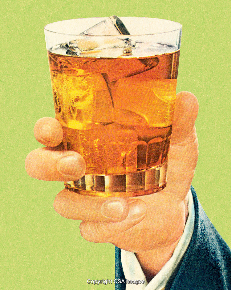 Holding a Glass of Whiskey with Ice Cubes in a Vintage Style