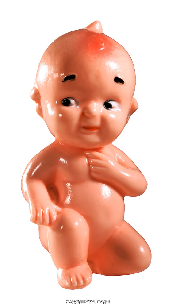 Vintage Plastic Toy Figurine with Humorous Expression and Nostalgic Charm
