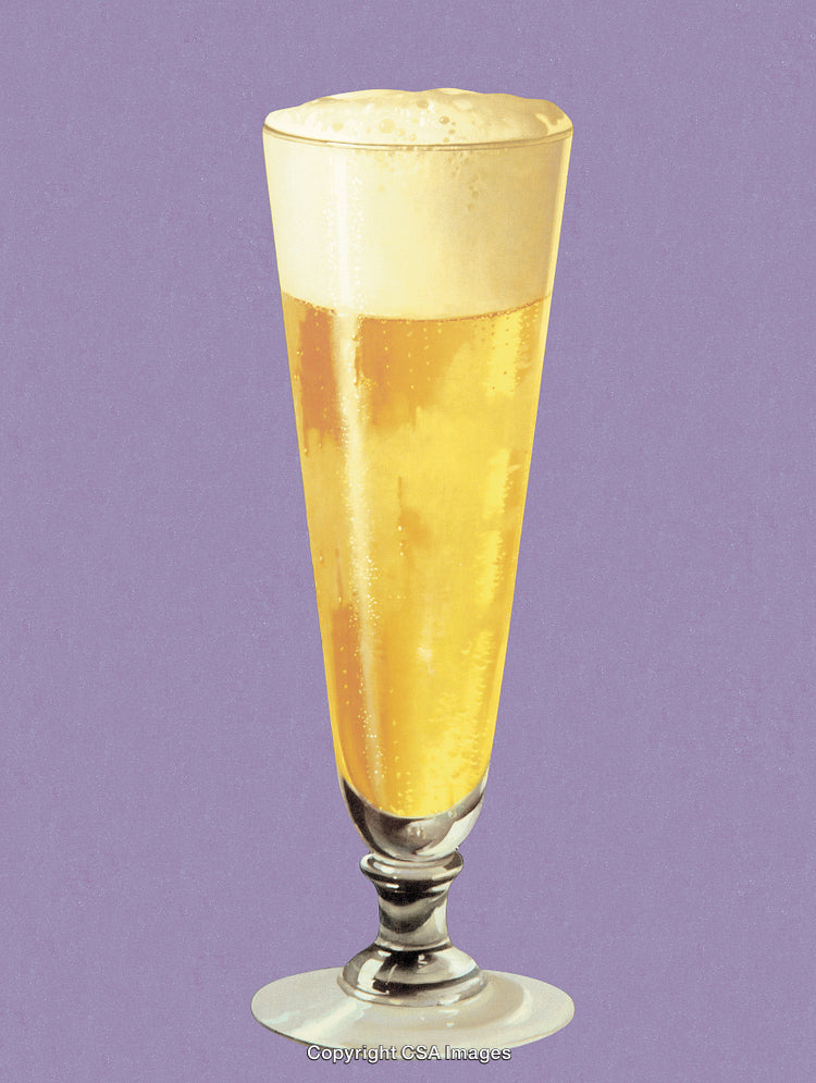 Tall Glass of Beer With Foam Against a Purple Background