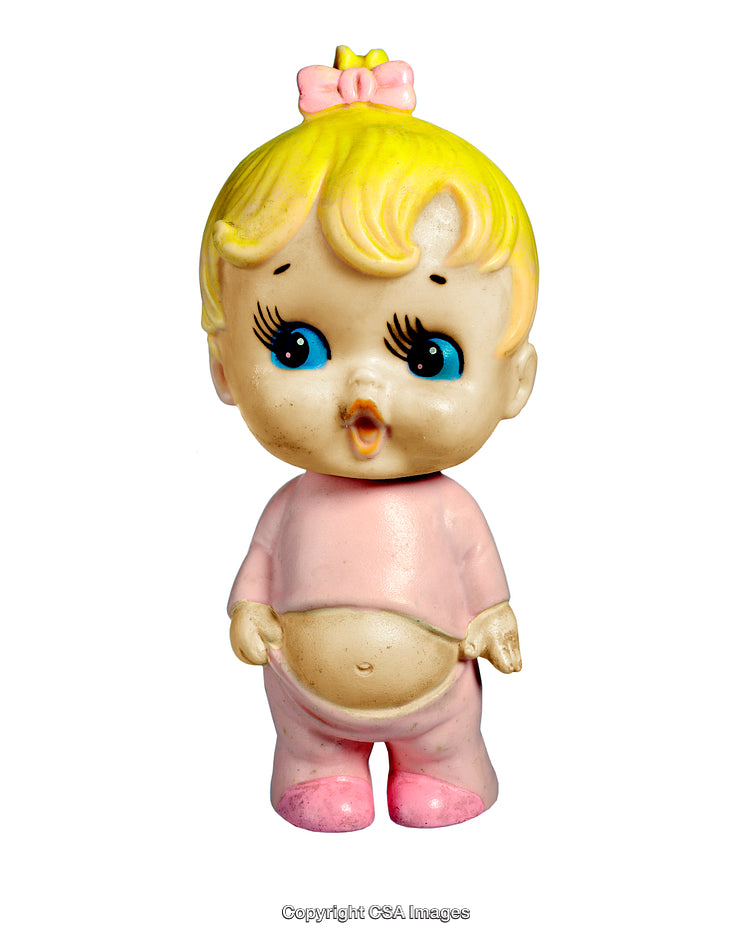 Vintage Plastic Doll Figure with Blonde Hair and Pink Outfit