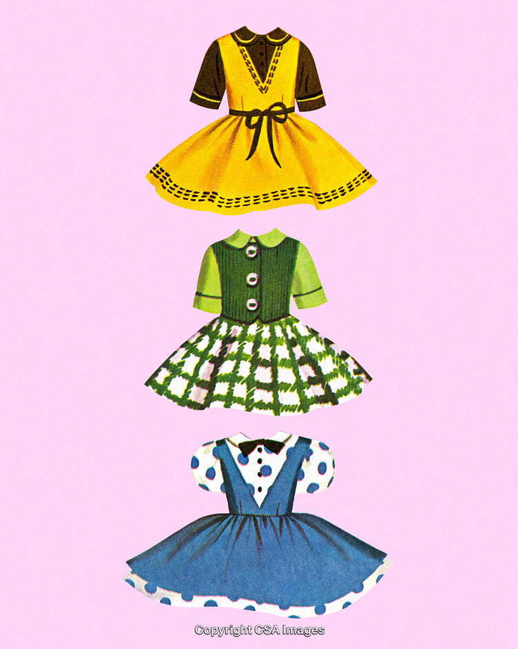 Vintage Children's Dresses in Bright Fashionable Colors on Pink Background