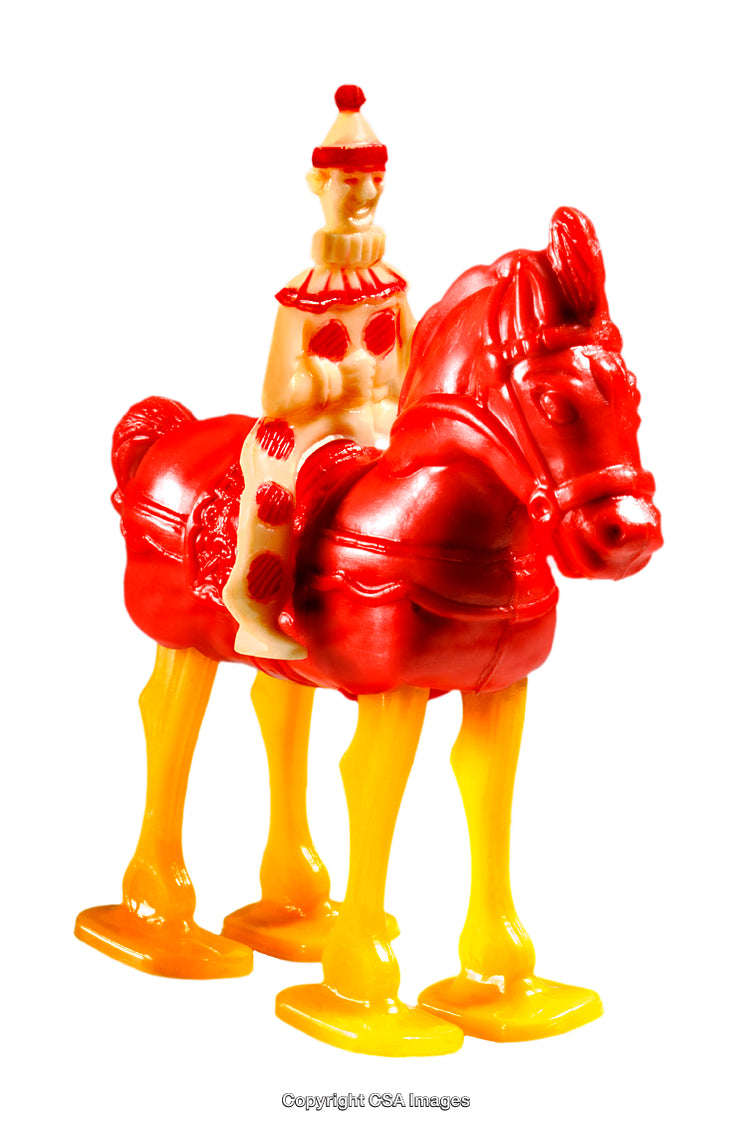 Colorful Plastic Toy Figurine of a Rider on a Horse