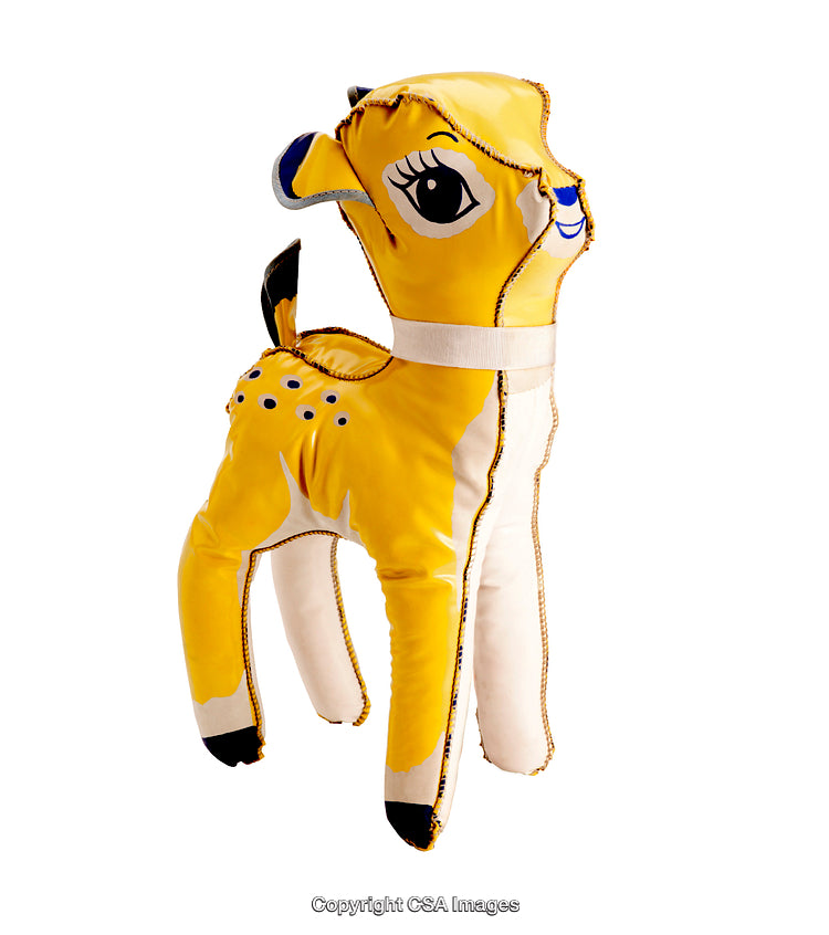 Colorful Yellow Plastic Deer Toy Against White Background