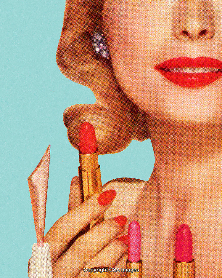 Close-Up of Retro Styled Woman with Lipsticks and Reds