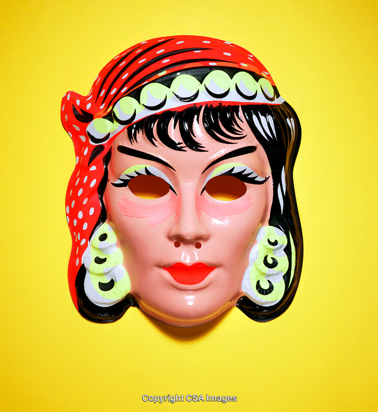 Vintage Plastic Mask with Polka Dot Scarf on Yellow Background