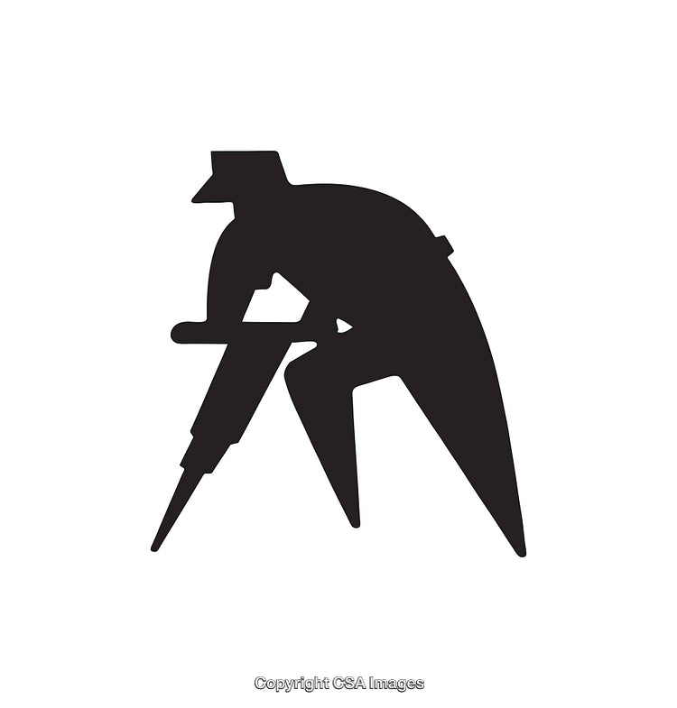 Silhouette of Construction Worker Operating a Jackhammer