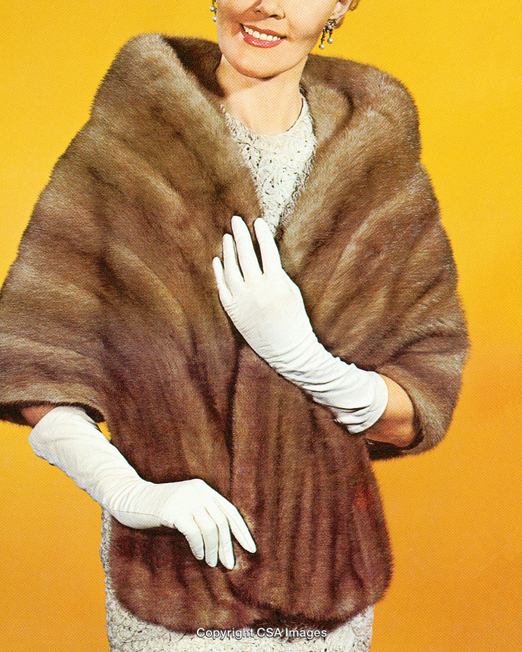 Elegant Woman Wearing Fur Shawl and White Gloves with Vintage Styling