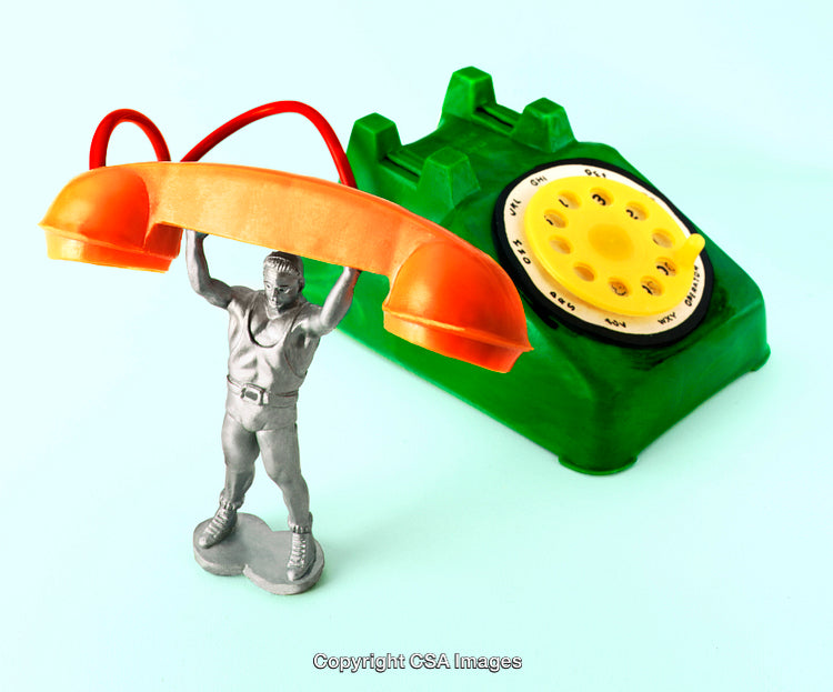 Colorful Toy Figurine Lifting Retro Telephone in Artistic Composition