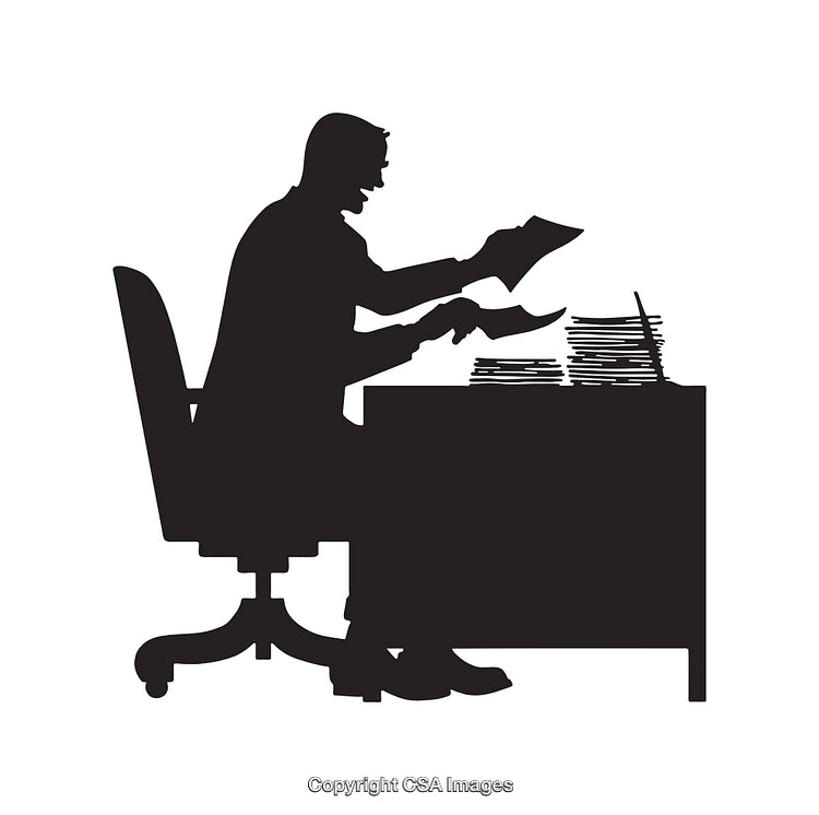 Black and White Silhouette of a Person Working at a Desk with Papers