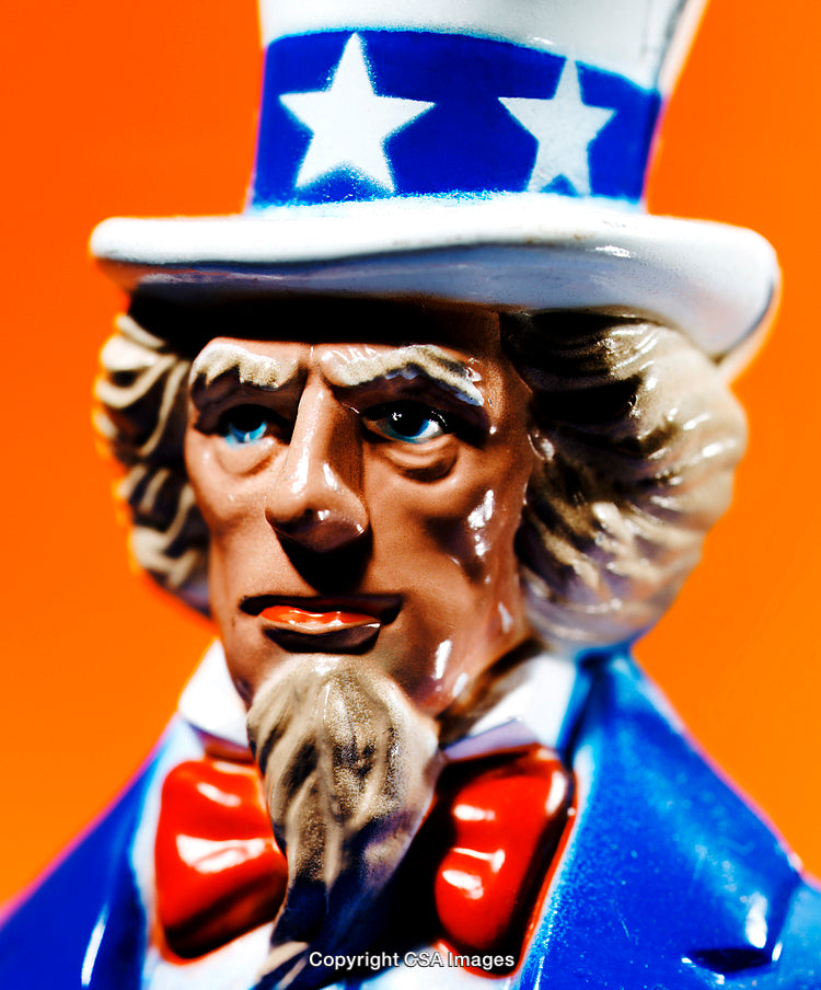 Patriotic Uncle Sam Figurine With Blue Stars and Red Bow Tie