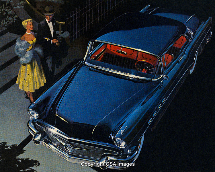 Retro Couple in Evening Attire Beside Classic Blue Car at Night