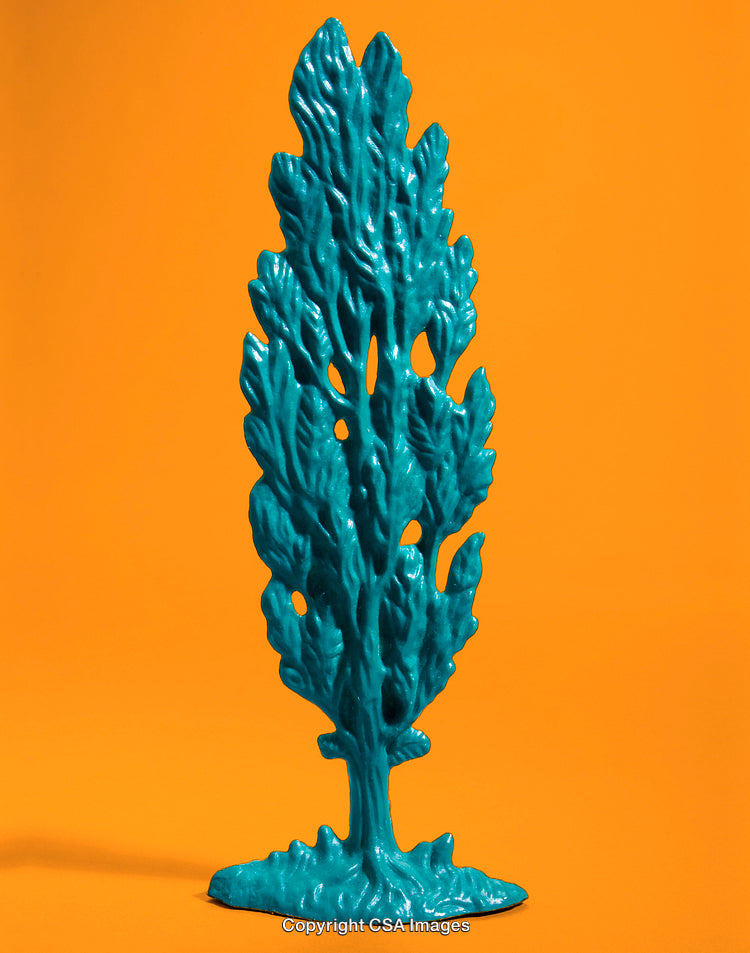 Blue Plastic Toy Tree on a Bright Orange Background